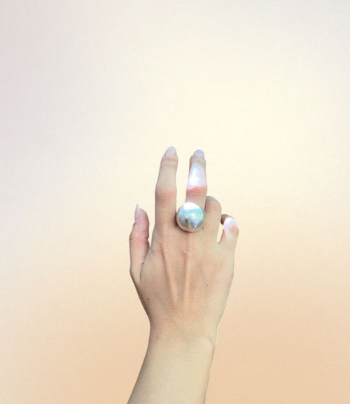 Hand wearing the Big Bubble Ring – bold, sculptural silver statement ring with oversized dome design
