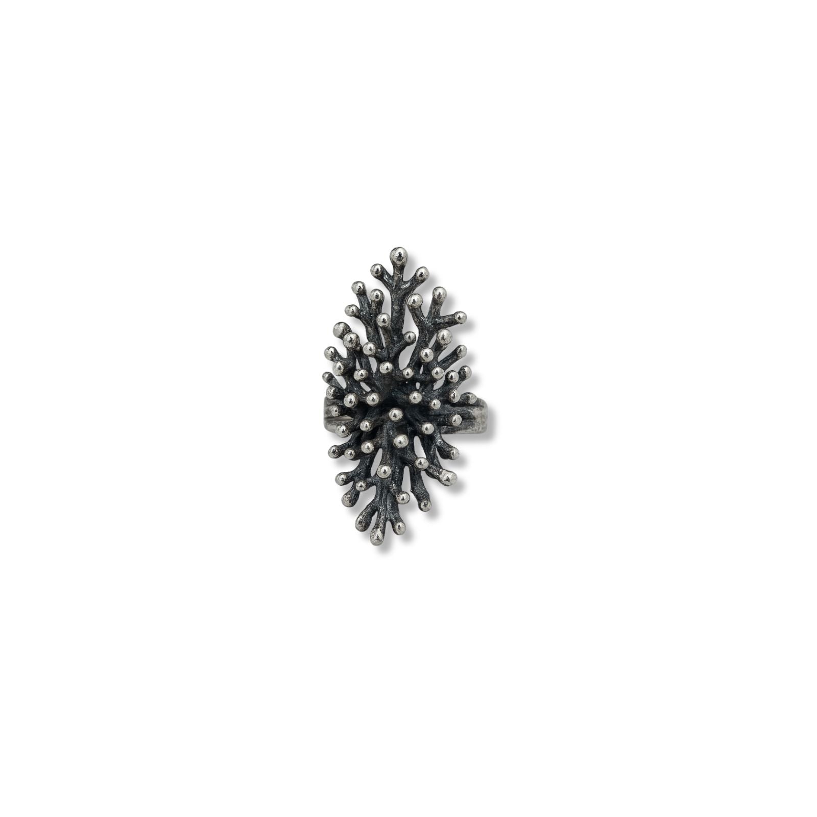 Textured silver-plated statement ring with pinecone-inspired organic structure, worn on finger
